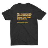 Shirt with the words macaroni and cheese is more important than the turkey 